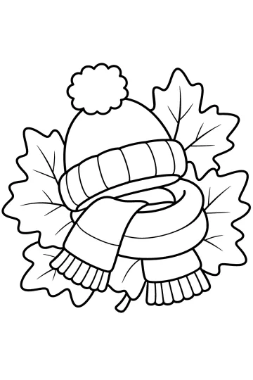 Cappello di lana con pon pon e sciarpa con frange sopra foglie d'autunno