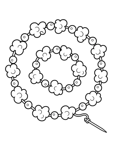 Guirlande de Noël enroulée avec du popcorn, des billes rondes, un fil visible et une aiguille.